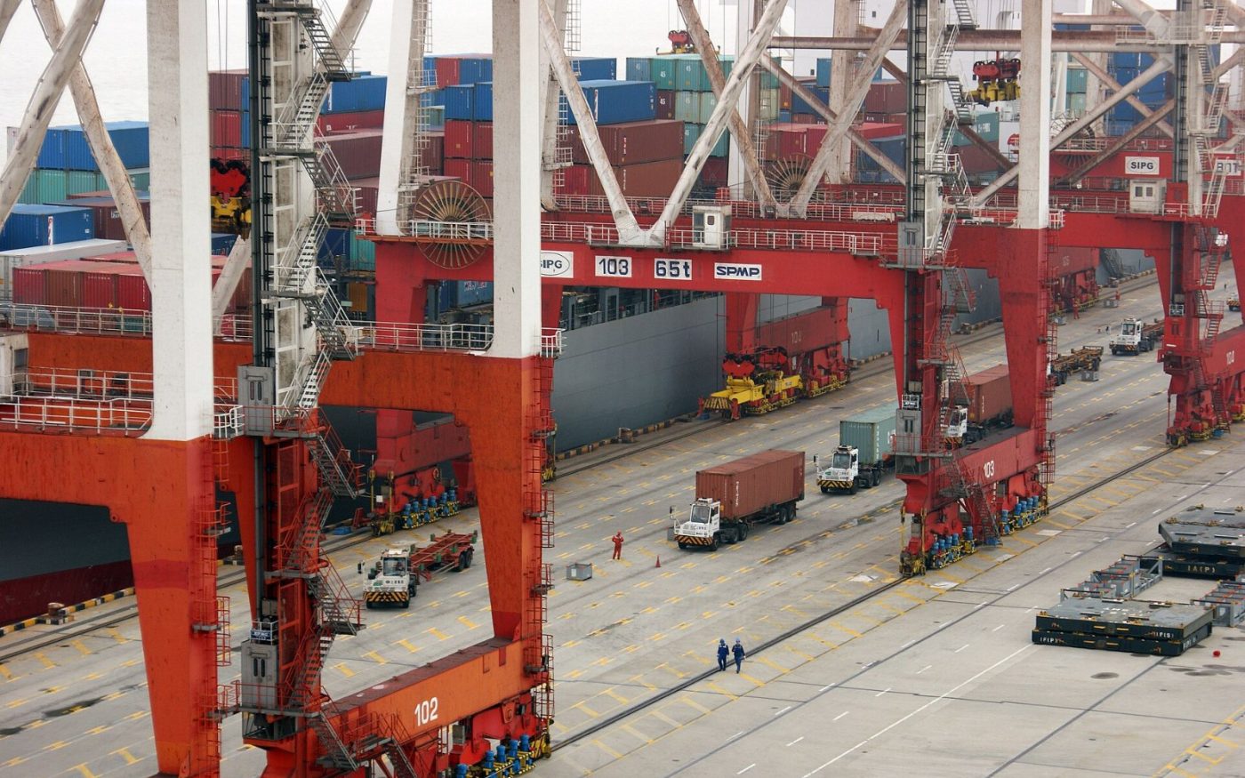 Shipping containers stacked at the Yangshan deep-water port in Shanghai, China